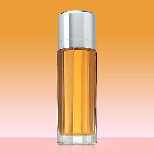 Calvin Klein Escape floral perfume bottle with notes of apricot, jasmine, amber, sandalwood, vanilla, and musk.